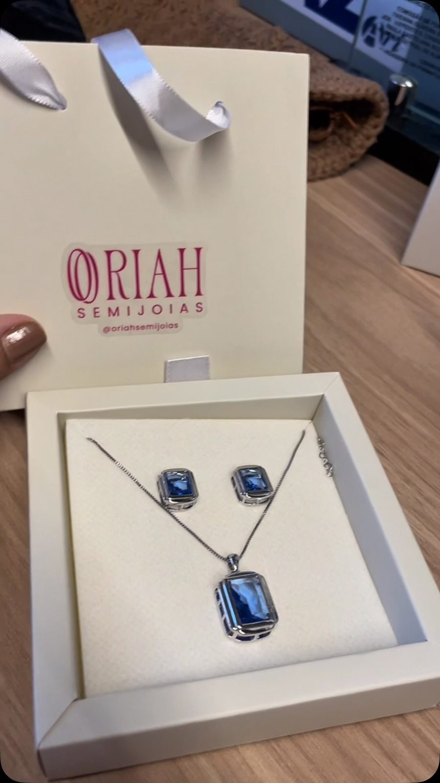 Embalagem da Oriah com conjunto azul